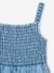 Gebloemde gesmokte meisjesjumpsuit in lichte denim lichtblauw - vertbaudet enfant 